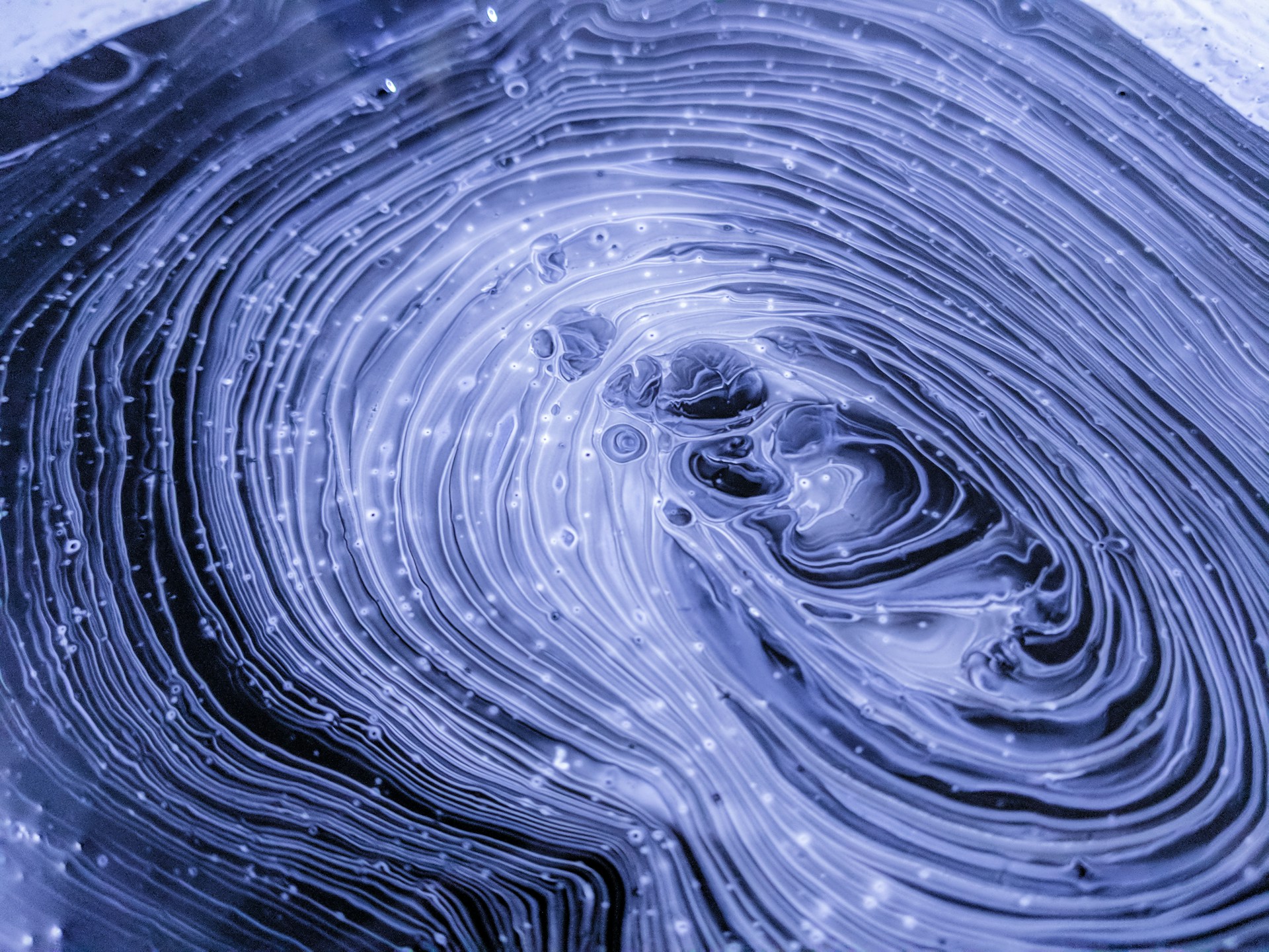 Blue fluid ripple pattern